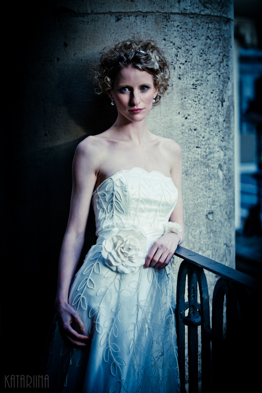 20120110144805 bride portrait leaning on a metal railing